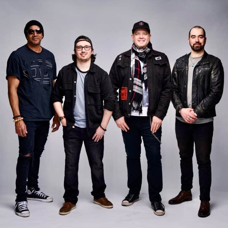 Band The Quickness playing energetic music on stage.